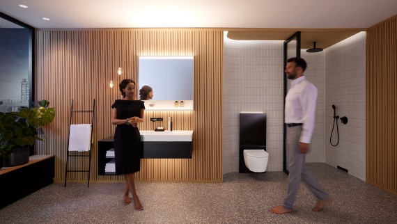 Man and woman in perfectly lit bathroom with Geberit in-wall systems (© Geberit) Man and woman in perfectly lit bathroom with Geberit in-wall systems (© Geberit)