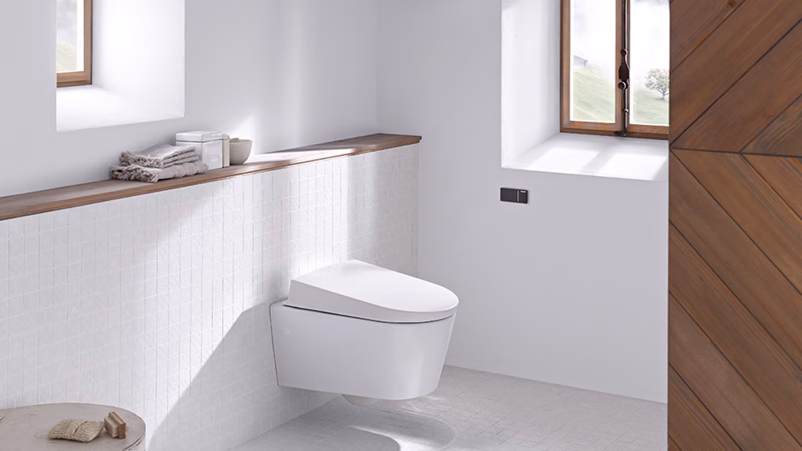 Rustic bathroom with wall-hung toilet and Geberit pre-wall toilet system Rustic bathroom with wall-hung toilet and Geberit pre-wall toilet system