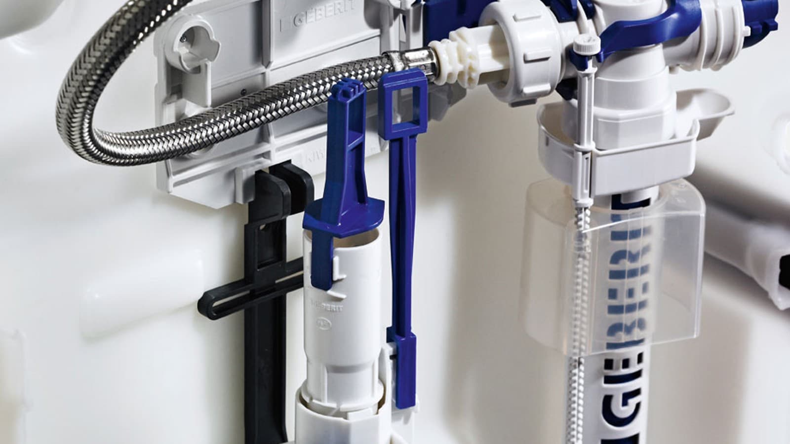 Detail of Geberit fill and flush valves installed in a concealed toilet tank Detail of Geberit fill and flush valves installed in a concealed toilet tank